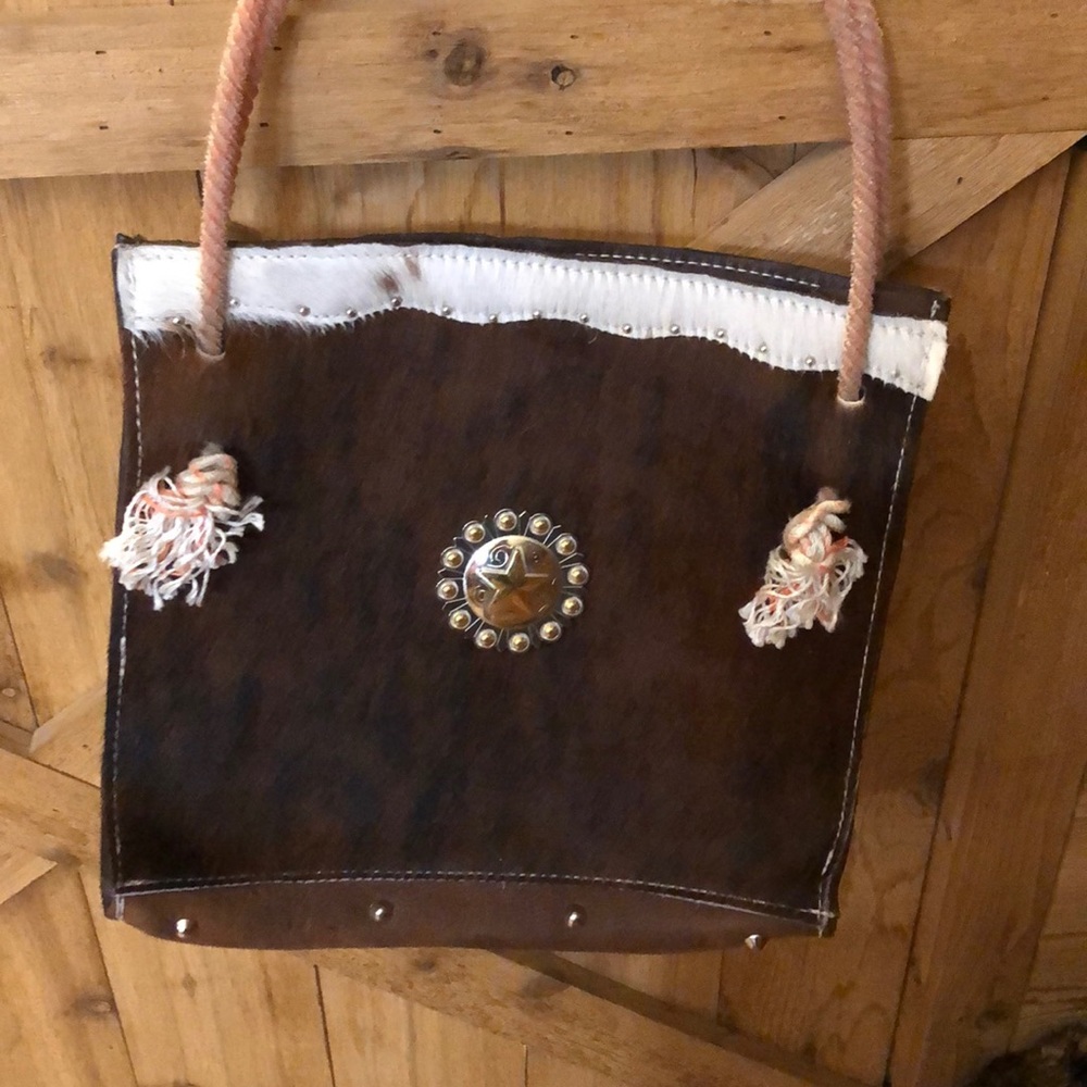 Western hair on cowhide handbag/tote.